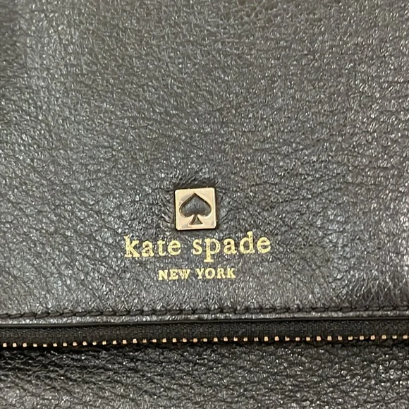 Kate spade everyday purse black leather with removable strap.